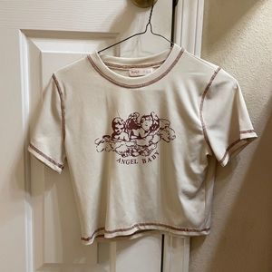 Romwe large brown and beige angel baby shirt